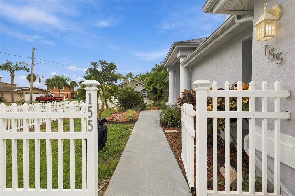 Photo of 155 Lake Shore Drive E, Palm Harbor, FL 34684 (MLS # TB8555659)