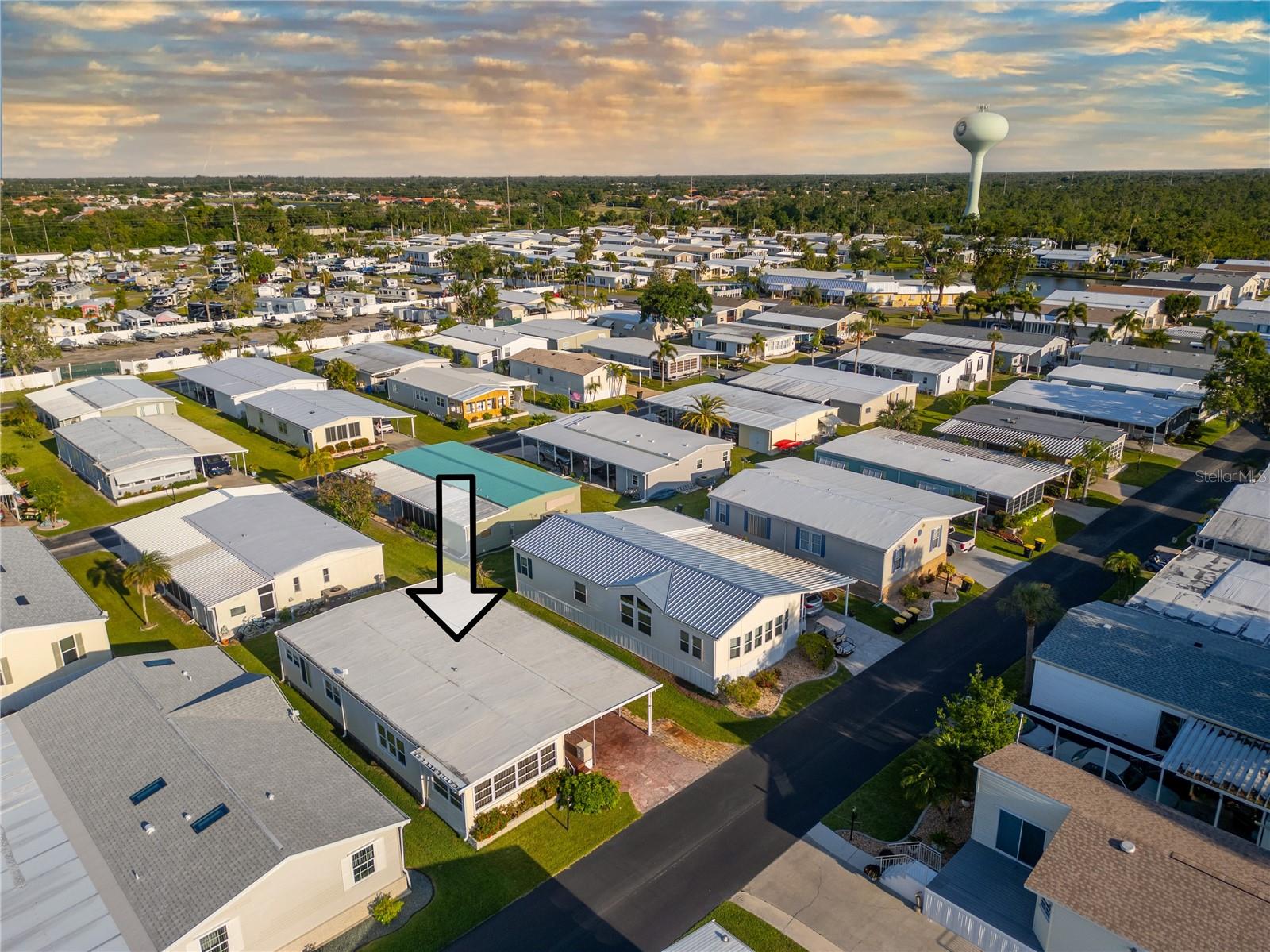 Humongous Price Improvement ! Seller will consider any "Fair Offer", Seller says SELL !! Unit #195 offers 1,104 Sq Ft. But Because of the 17 X 10 Sunroom is also AIR CONDITIONED it's effective SQ Ft is 1,274 ! Eagle Point is a Resident OWNED 55 & older MH Park close downtown, the Charlotte Harbor & I 75. This Water Front Community is located at Alligator Creek, a Navigable Creek leading to Charlotte Harbor. Enjoy Fishing & Year Round Beautiful SUNSETS. This home has Many Updates. The Kitchen was remodeled, including hard surface countertops, appliances, Soft Close Drawers & Cabinetry. AC unit & new insulated duct work in 2020 boasts a 10 Year Transferable Warranty. Primary bathroom has Walk In shower. You will surely Enjoy Relaxing in the 17 x 10 Air Conditioned Sun Room with Friends & Family ! Or if you desire fresh air just move to the 16 X 12 Screened in Lanai ! This enclosure leads to the enclosed 13 X 12 Laundry / workshop. This is a PET Friendly community & Perfect for Year-Round living or your Winter Getaway :-) This is a very active community offering a heated Pool, large Club house, Fabulous Kitchen, library and activity room. Recreation Room with card & pool tables, outdoor kitchen, fire pit, bocce ball courts, & boat launch. Boat storage may be available for rent at a very low cost. Eagle Point is a PARK-SHARE with a minimum of 5 shares upon home purchase at $1,000 each share. The number of shares purchased will determine your quarterly association dues; the more you buy, the Lower your dues ! Depending on the number of shares purchased, dues currently range from $789.11 to $1,145.37 paid quarterly. The dues include lot rent, water, sewer, trash removal, recycle, heated pool, all the recreational facilities and private road maintenance. Sold as TURNKEY.
