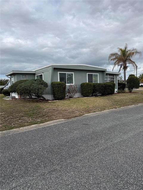 Photo of 89 Mauna Loa Drive, Leesburg, FL 34788 (MLS # G5109095)