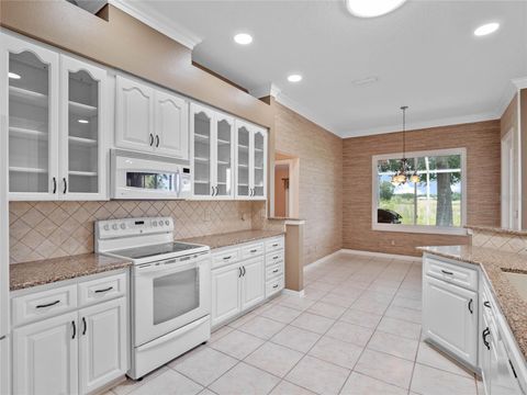 Single Family Residence in LEESBURG FL 4909 SAINT ANDREWS ARCADE 13.jpg
