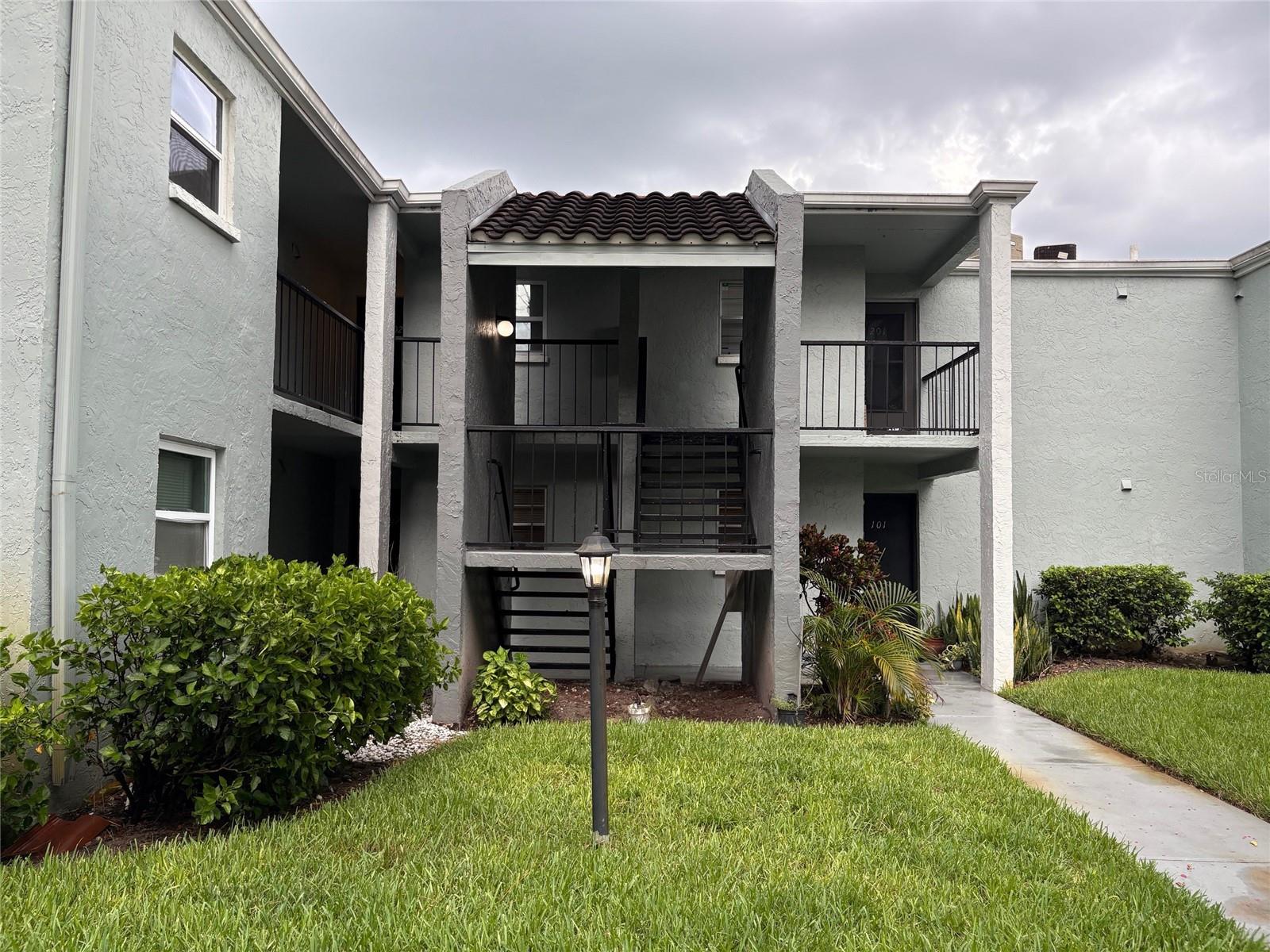 One or more photo(s) has been virtually staged. Clean 1-bedroom, 1-bathroom 2nd floor concrete block condo near USF. Somerset Park is a gated, pet-friendly community at the corner of Bruce B Downs Blvd and E Bearss Ave. Unit features 1 large bedroom w/walk-in closet and ceiling fan, 1 bathroom with shower/tub combo. Large living room w/spot for eat-in table and sliders out to covered lanai. Beautiful kitchen w/granite countertops, real wood cabinets and all appliances included w/pass through to living room and no carpet in the entire unit. Lanai has laundry closet w/newer washer and dryer included and pond view. Unit comes with one assigned parking space w/additional parking available throughout the community. Somerset Park has a community pool, fitness center, community lounge and tennis courts and also features roaming security patrol at night. Low HOA includes water/sewer/trash. Tenants require HOA approval. Average rental for this sized unit is $1,250-$1,350/month. Ideal location near USF, hospital, shops, restaurants and schools and only minutes from the interstate.