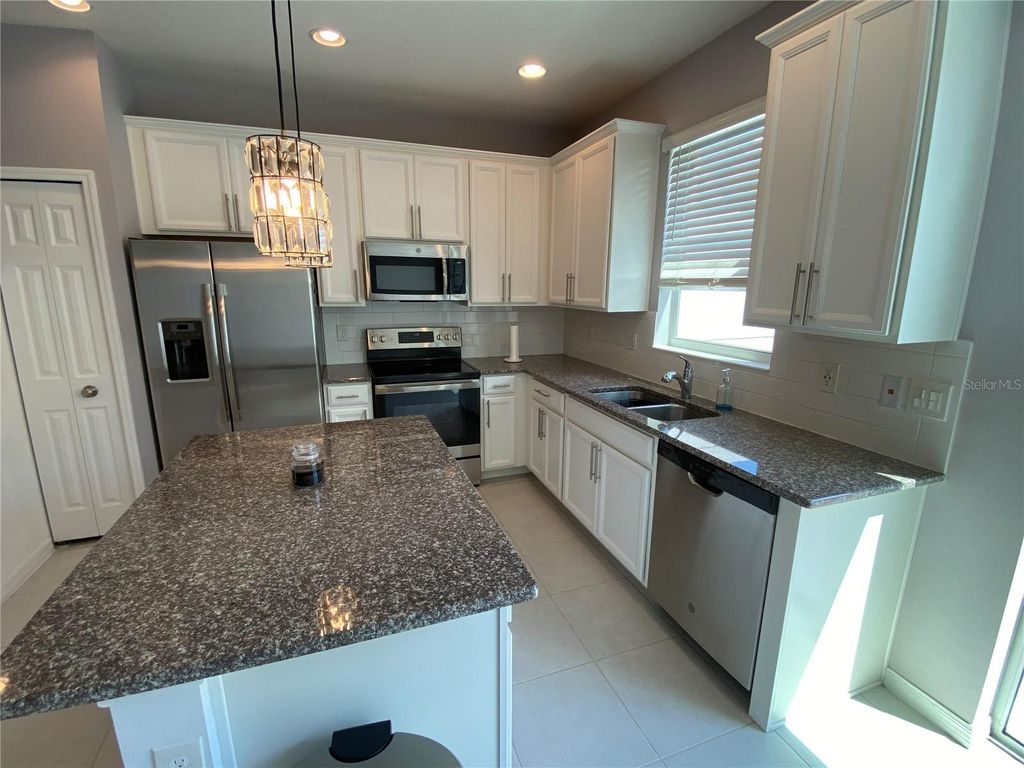 Photo of 2217 Sedge Grass Way, Orlando, FL 32824 (MLS # O6418389)