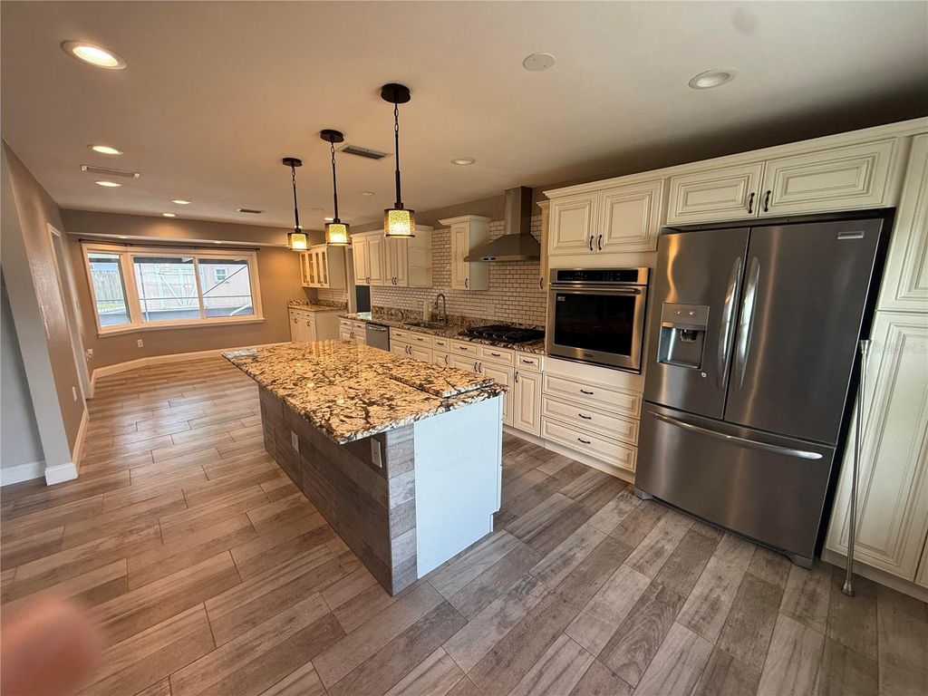 Photo of 1410 Saxon Boulevard, Deltona, FL 32725 (MLS # V4948775)