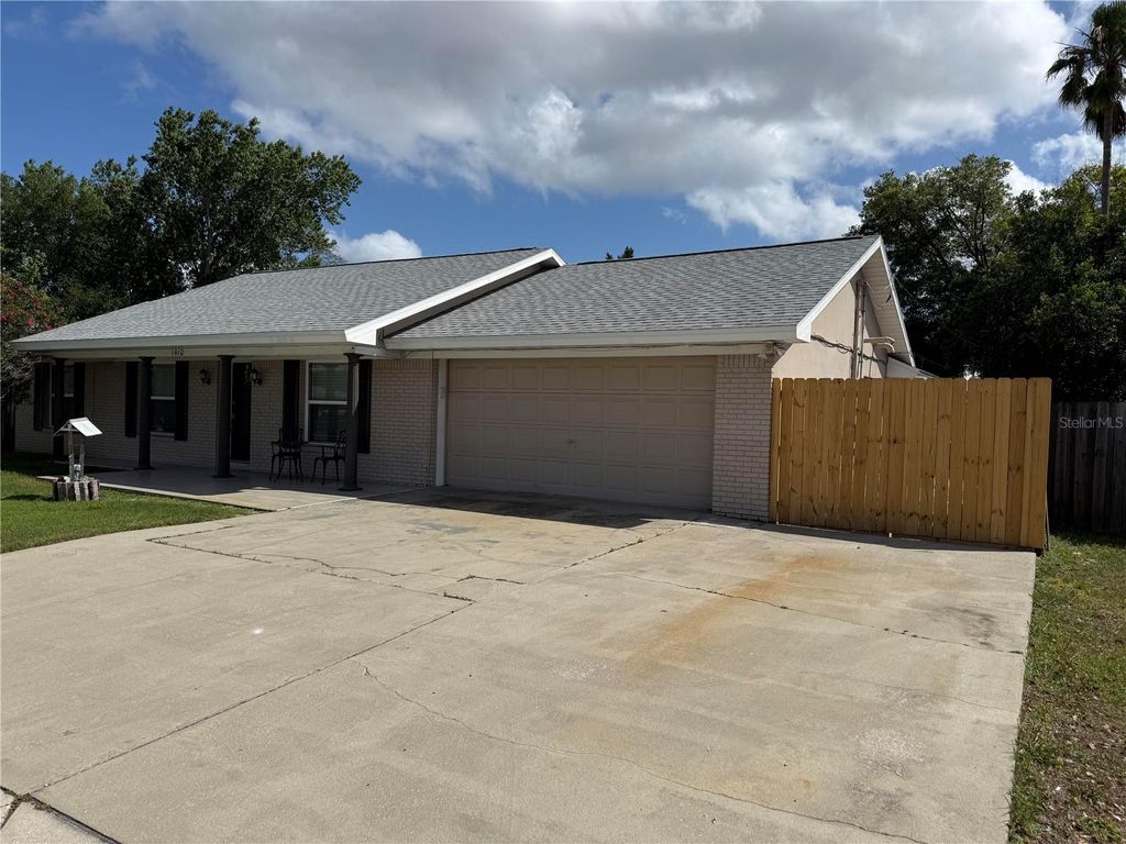 Photo of 1410 Saxon Boulevard, Deltona, FL 32725 (MLS # V4948775)