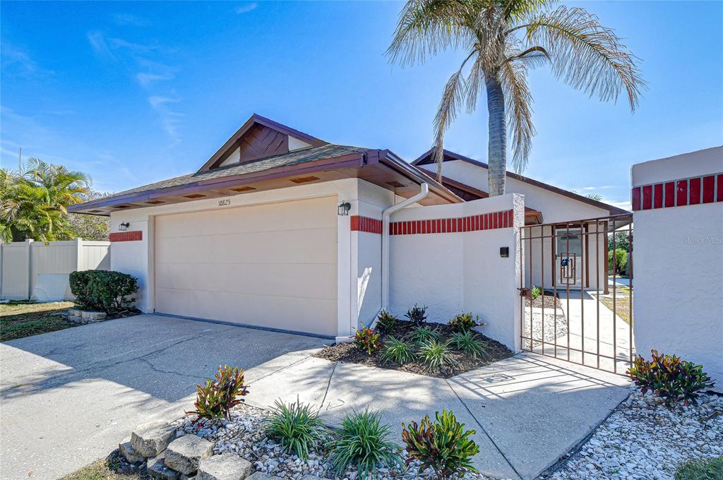 Photo of 10825 Venice Circle, Tampa, FL 33635 (MLS # TB8439570)