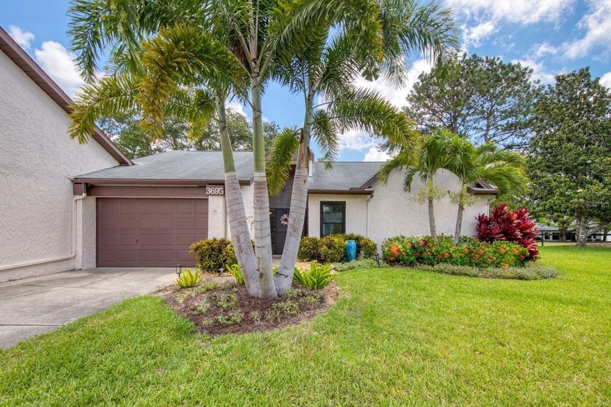 Under contract-accepting backup offers. Beautifully remodeled, expanded, and updated golf course view villa in Highland Lakes, Palm Harbor's premier 55+ golf & more community. You'll love the open concept plan and the feeling of a single family house in this end unit at the back of a quiet cul de sac. The villa sits back from the street with a long driveway and has an attached garage big enough for your vehicle, golf cart, and extra gear. Rest easy with new hurricane impact windows & doors and the new 4 Point Inspection report required for Florida insurance is available for review. Professionally designed landscaping with fountains both front & back. A screened lanai with art glass double doors provide a gracious entry. Inside, there are open spaces filled with natural light and a lovely golf course view. Beautiful luxury vinyl plank flooring throughout is complemented by a skylight and neutral wall colors ready to welcome your decor. Room-for-a party dining area, and an updated kitchen features a breakfast nook with a private tropical view. The home office addition opens to the rear screened lanai: both show off a picture perfect view of the 5th fairway of the Red Course. The spacious and serene master suite features an updated en suite with a luxe vanity, step in shower, and a walk in closet. Bedroom 2 also has a large walk in closet, is adjacent to the updated guest bathroom, and is well separated for guest privacy. Sutton Court is a Planned Unit Develoment sub-HOA within Highland Lakes - no worries about excessive condo fees, more freedom, and more favorable financing options as you own the lot instead of just a condo unit. Sutton Court service fee is just $186/month and includes lawn service, irrigation water & maintenance, exterior painting, trash removal, cable TV & high speed internet. It is a perfect low maintenance permanent home, or a great option for a "lock and leave" seasonal retreat. You will love the friendly country club atmosphere of Highland Lakes and the resort style amenities. For just $126/month, residents enjoy free golf on 3 private executive courses, heated pools & spa, tennis & pickleball leagues, bocce, shuffleboard, a bowling league & lots of fitness programs, including yoga. The main clubhouse is the venue for more entertainment & social events than will fit on your calendar. There is a library, cards & games, billiards & interest clubs. The Arts & Crafts Annex has a full woodshop, art studios & crafts classes. At the Lake Tarpon Lodge, there's also a heated pool, picnic & party facilities, fishing pier & community pontoon boats. Resident amenities include free RV or boat storage in a secure lot with boat ramp & an open dock. Palm Harbor is the best location in Tampa Bay with great shopping & restaurants, Gulf beaches, parks & trails, rich cultural resources, exciting pro sports & excellent medical facilities. Less than 30 minutes from 2 international airports and an award-winning cruise port. Isn't it time for you to have your own slice of Palm Harbor Paradise?