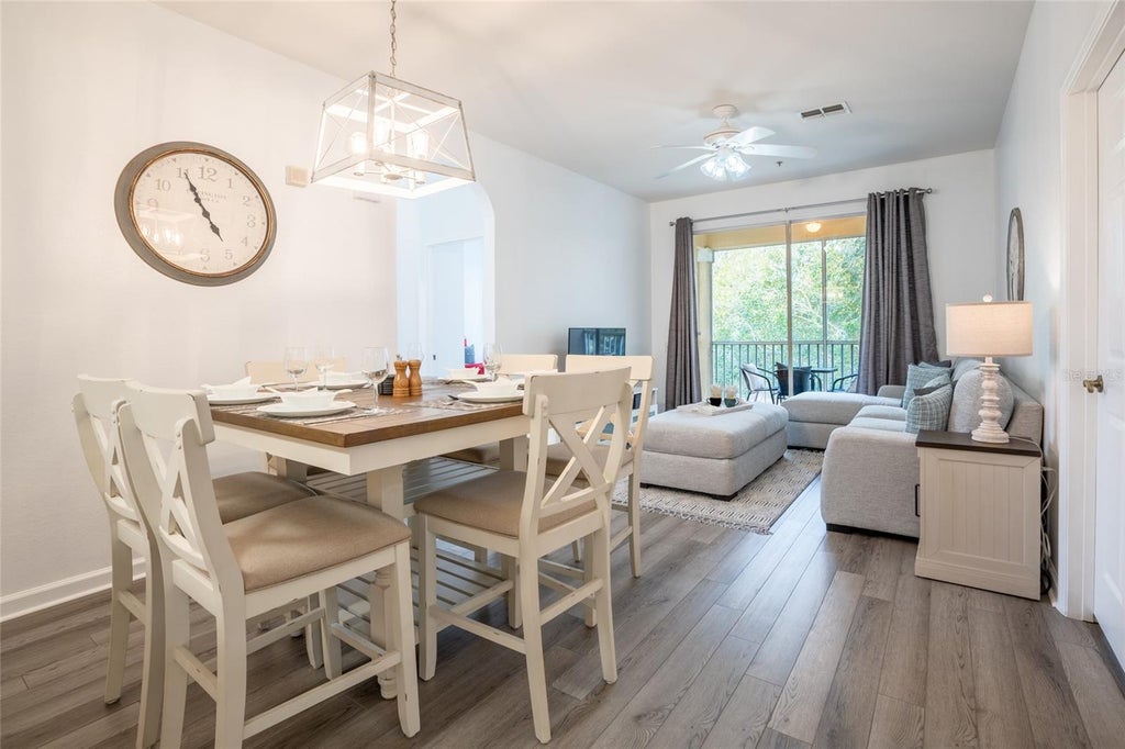 Photo of 2303 Butterfly Palm Way #303, Kissimmee, FL 34747 (MLS # O6419689)