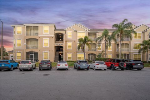 Photo of 2303 Butterfly Palm Way #303, Kissimmee, FL 34747 (MLS # O6419689)