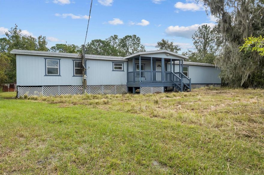 Discover a rare opportunity on nearly 3 acres in North Lakeland. This expansive property is perfect for investors, builders, or visionaries looking to create something extraordinary. The existing manufactured home has been mostly cleared to the studs, offering a wide-open framework ready for a complete redesign or total rebuild. Whether you’re planning a modern remodel or a new construction, the generous acreage provides endless possibilities for expansion, outdoor living, or additional structures. A large metal outbuilding adds value and versatility for storage, equipment, or workshop use. The land itself offers plenty of space for privacy and creativity, surrounded by a peaceful rural setting while remaining convenient to major roadways, shopping, and schools. With no HOA and ample room to grow, this property is a blank canvas waiting for the right buyer to bring their vision to life.