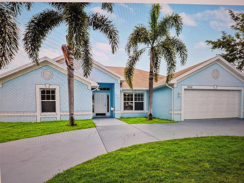Photo of 1949 SE Airoso Boulevard, Port Saint Lucie, FL 34984 (MLS # TB8554279)