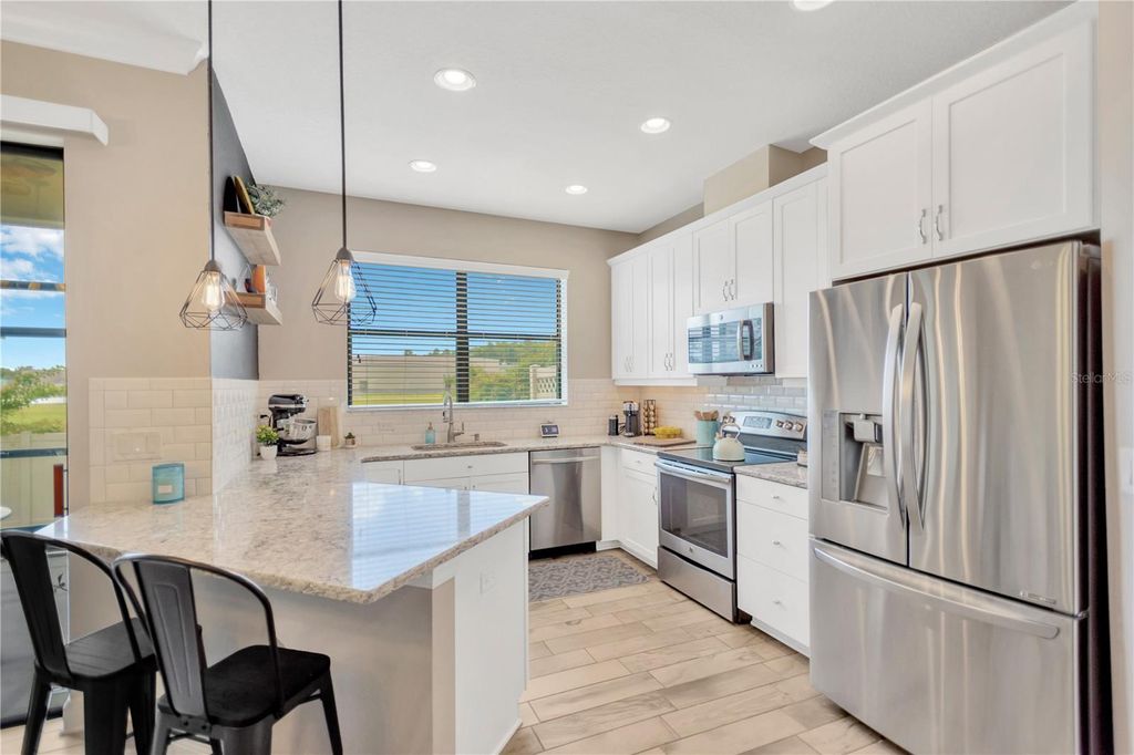 Photo of 11632 Crowned Sparrow Lane, Tampa, FL 33626 (MLS # TB8416202)