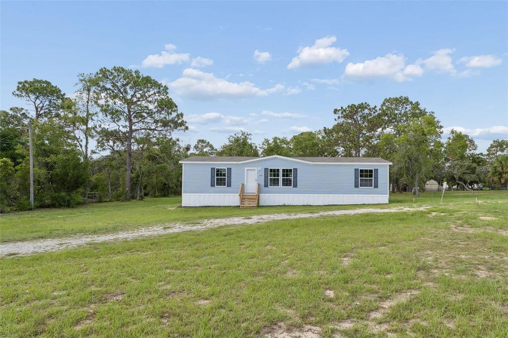 Photo of 13320 Sun Road, Brooksville, FL 34613 (MLS # W7887552)