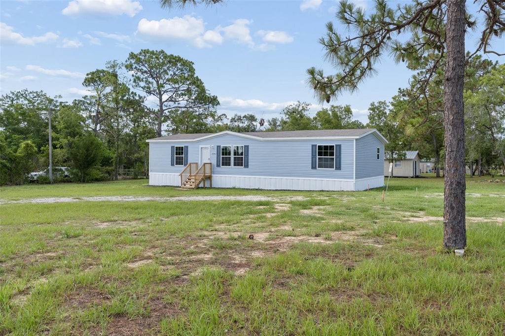 Photo of 13320 Sun Road, Brooksville, FL 34613 (MLS # W7887552)