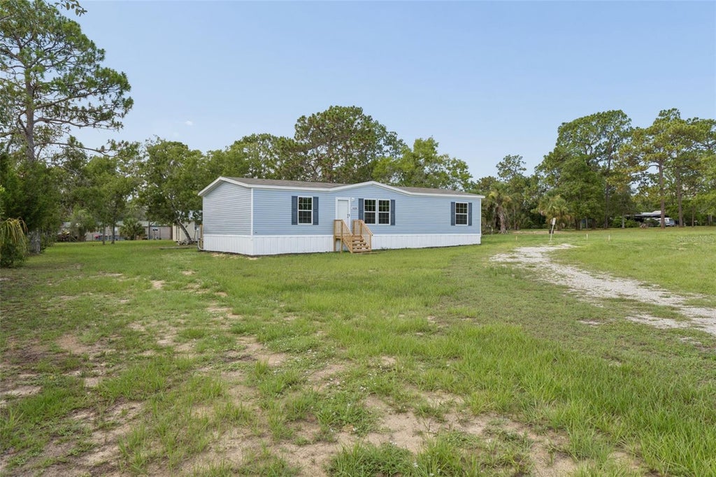 Photo of 13320 Sun Road, Brooksville, FL 34613 (MLS # W7887552)