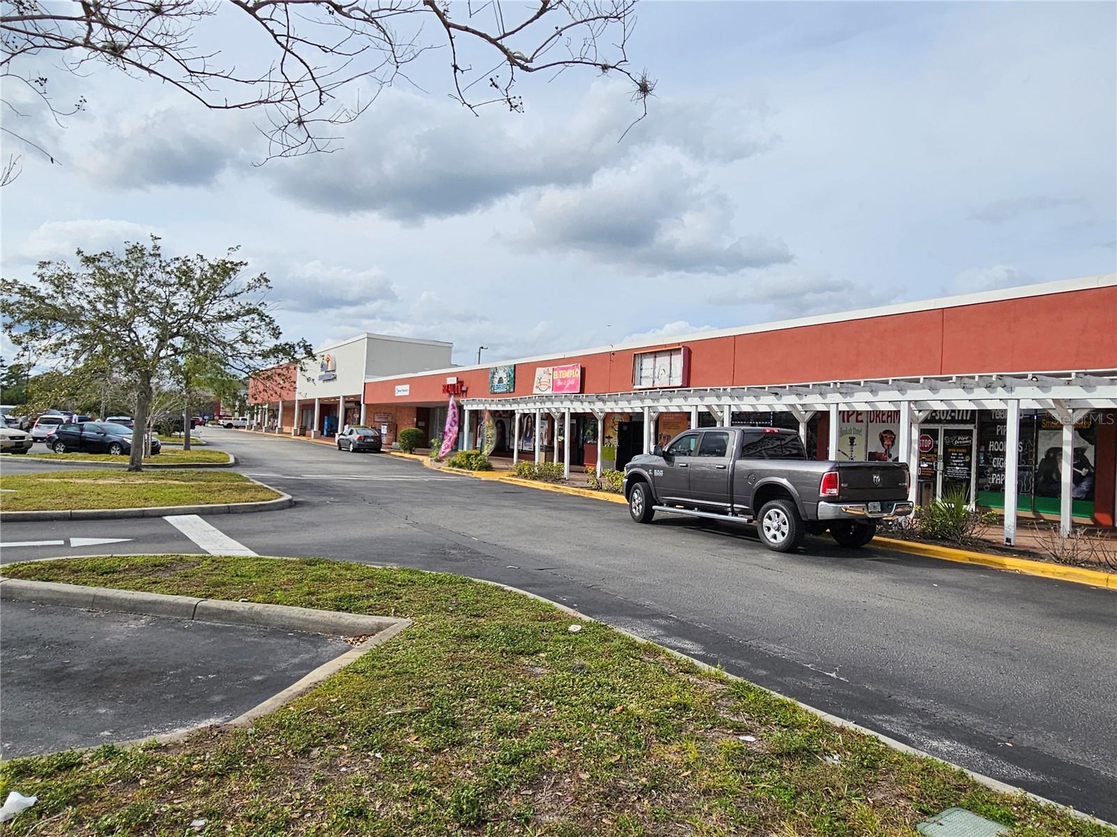 Fantastic Location!! Retail Store Front In Extremely Busy Strip Mall Shopping Center. Extremely low Condo Fees for a Unit in a Busy Shopping Center of only $150 per month!
Unlock an extraordinary business opportunity with this prime retail storefront nestled at the vibrant intersection of 17-92 and the 417 overpass in a bustling strip mall shopping center. Revel in unbeatable visibility and foot traffic, setting the stage for success. The interior is ready for a custom build-out to create a distinctive establishment tailored to your business needs. The owner may we willing to explore a lease option. Embrace the benefits of a thriving community, diverse neighboring businesses, and excellent accessibility. Act now to secure this fantastic investment – schedule a viewing today and bring your vision to life in this strategically positioned space! Extra Large Parking Area with Green Space directly in front of the Unit. Also parking area at the rear entrance to the Unit.