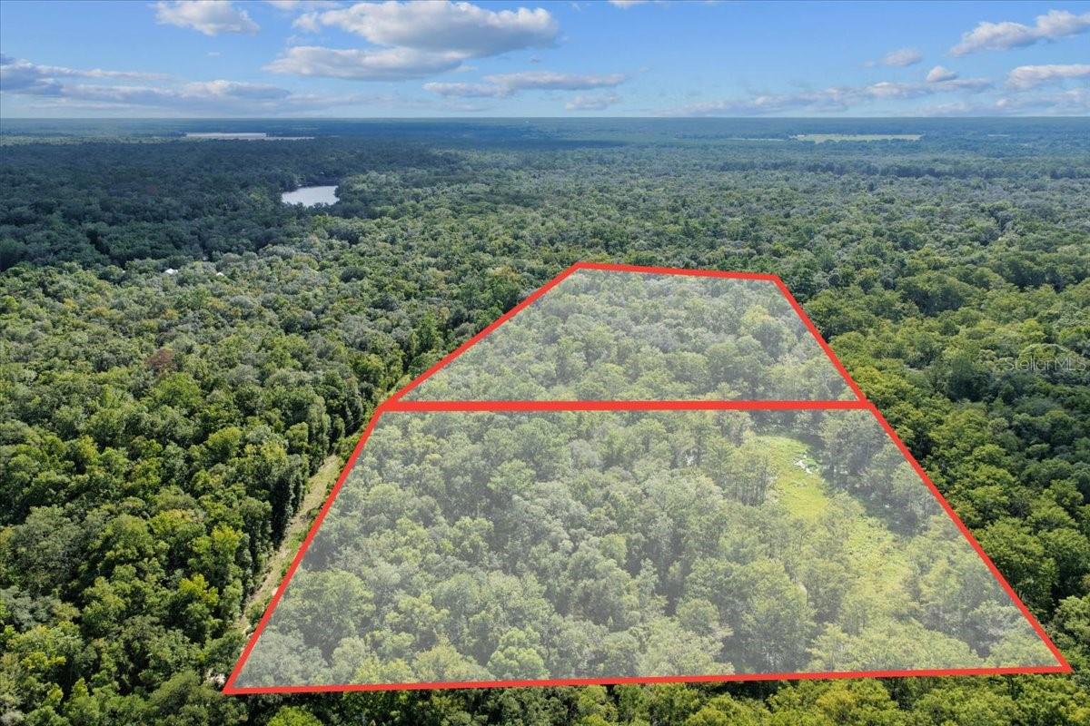 Amazing 11.88 acres perfect for camping , hunting and enjoying the great outdoors! This property is located in Gilchrist County a short drive to the great Suwannee River. Property is in flood zone AE/FW. Beautiful Florida hardwords and wildlife galore, call today for more information!