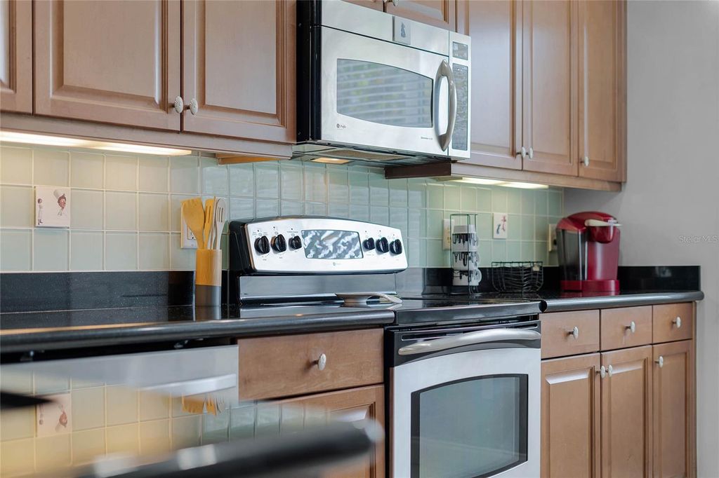 Photo of 7468 Excitement Drive #102, Reunion, FL 34747 (MLS # O6418716)