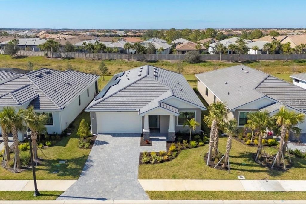 Photo of 18575 Midsummer Place, Venice, FL 34293 (MLS # N6143625)