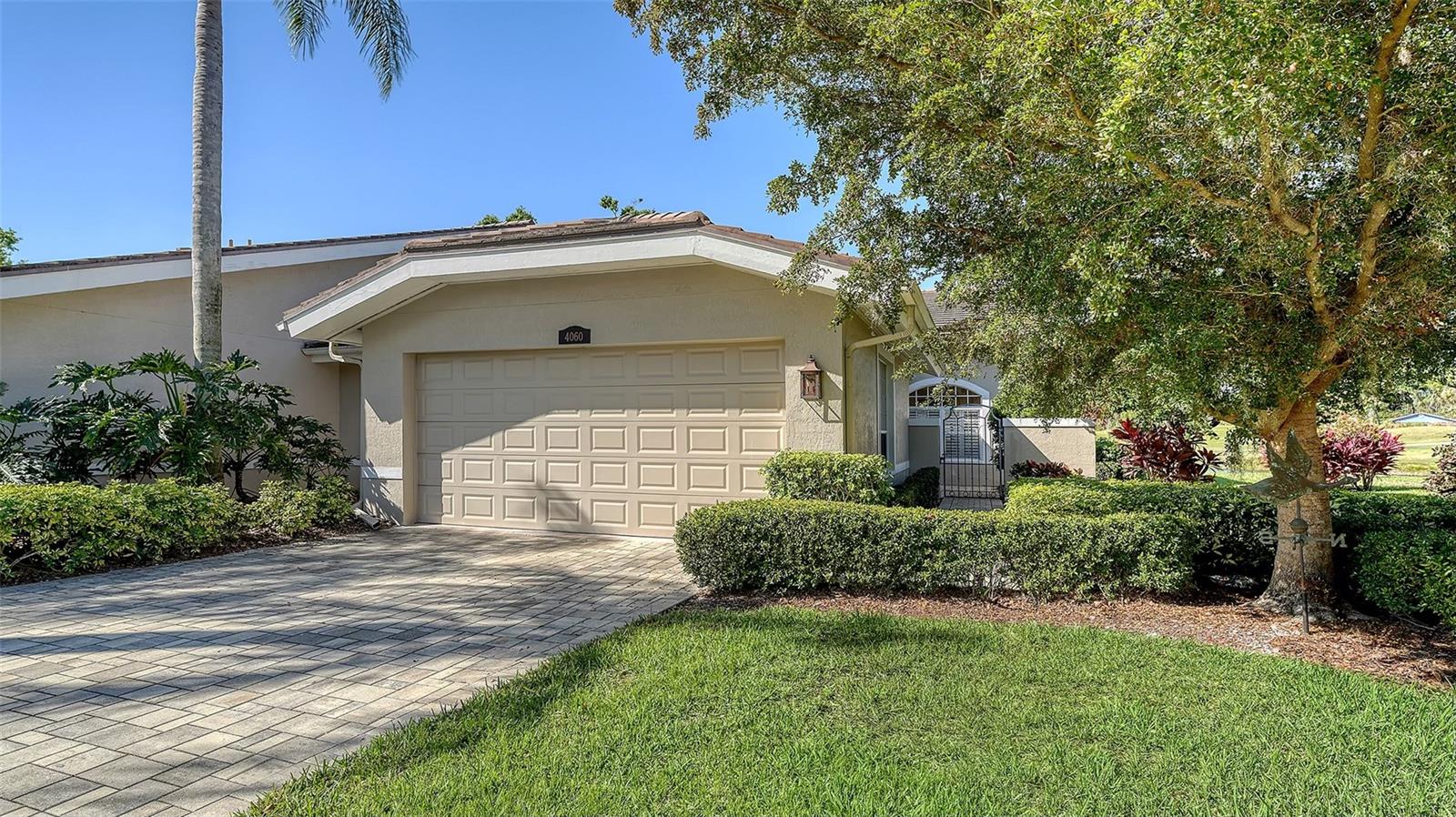 LOCATION, LOCATION, LOCATION!!Gorgeous light and bright villa available for an ANNUAL rental in the sought after community of Penshurst Park in the Meadows of Sarasota. This villa is not to be missed with it's upgrades, private courtyard entry way, open floor plan, split bedrooms and plenty of room to spread out. The villa has a very large living room with bonus space/dining room combination, desk nook, decorative fire place, soaring ceilings and plenty of space for multiple sitting areas plus big floor to ceiling windows to view a sparking lake and golf course views. The newly renovated kitchen has a hammered copper sink, stainless appliances, solid wood soft close cabinets, quartz counter tops and a center island. The primary suite has a large bedroom with lots of windows, room for a sitting space, custom walk in closet and an en suite bathroom with double sinks, walk in shower, garden tub and water closet. The guest bathroom has a tub/shower combination. The home has a laundry room with utility sink and a two car garage. The Meadows community has walking/biking trails, park like feel, community pool with hot tub, fitness center and pickleball courts. Close to beaches, downtown Sarasota, I75 as well as both Fruitville Road and University Parkway with all the shopping, grocery stores, coffee shops and much much more. Call today as this beauty will not last long!!!! HOME IS BEING RENTED UNFURNISHED. PHOTOS JUST FOR STAGING.