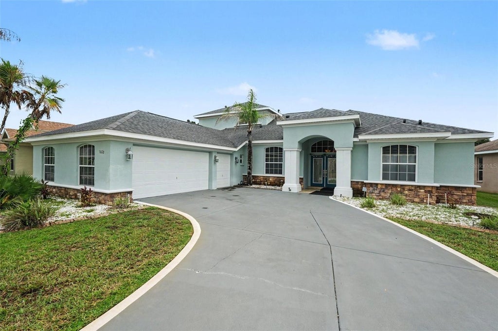 Photo of 5020 Gevalia Drive, Brooksville, FL 34604 (MLS # O6430222)