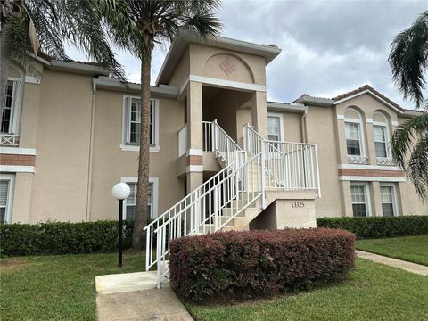 Photo of 13325 Fairway Glen Drive #202, Orlando, FL 32824 (MLS # O6349408)