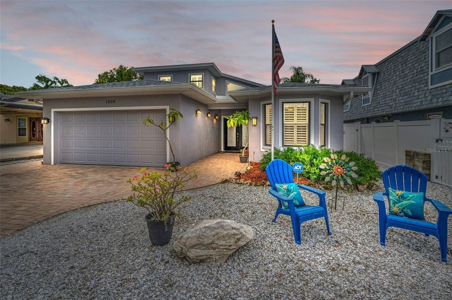 DOWNTOWN PALM HARBOR! GOLF CART FRIENDLY! NO HOA! This stunning 3 bedroom 2 1/2 bath (plus office), 2006 custom-built residence is conveniently located just blocks away from downtown and is close to the Pinellas Trail! Enjoy a ride a few short blocks to restaurants with live music, breweries, craft fairs, wine walks, and a multitude of other fun activities! The current owners have enhanced this property to the next level with a NEW ROOF(2025), NEW INTERIOR and EXTERIOR PAINT, NEW VINYL FENCING, a RESCREENED LANAI, ADT security system, NEW LARGER A/C unit (2023), HOT WATER HEATER (2023), QUARTZ COUNTERTOPS, and STAINLESS STEEL APPLIANCES As you arrive to this gem, the paver driveway leads you to a covered porch where double front doors welcome you into the spacious foyer. Inside, shimmering engineered hardwood floors span most of the home, adorned with a classic look of stained 5 1/4 inch trim and doors, including a turned staircase which adds a touch of sophistication. You will be captivated by the high ceilings and the expansive open great room creating an inviting space for all your gatherings with abundant natural light. There is surround sound in the great room and in the enclosed back lanai area. The kitchen is a chef's delight, featuring abundant storage, beautiful wood cabinetry, a full pantry, and convenient pull-out drawers. The oversized quartz counter provides ample seating for casual dining or entertaining with a built-in wine cooler. A separate built-in desk area is perfect for multitasking. Adjacent to the kitchen, you'll find a versatile room with a bay window seat and built-in storage. This room can serve as an office or a cozy breakfast nook, allowing you to customize the space to suit your needs. Natural light fills every corner of this home, thanks to solar tubes strategically placed throughout. Plantation shutters add charm to this Palm Harbor gem. The powder room, designed with an artist's flare, is discreetly tucked away behind a pocket door. Convenience is at its peak with the first-floor primary suite, offering easy living and privacy. The ensuite primary bath is a luxurious retreat, boasting an oversized tile shower with a built-in seat and dual shower heads. Dual sinks with new quartz countertops provide ample space, and the master bedroom features French doors that open to a screened-in patio, allowing you to enjoy the Florida sunshine and gentle breezes. Completing this primary suite is a beautiful walk-in closet with custom built-ins, ensuring your wardrobe is always at its finest. A gracefully turned staircase leads you to the second floor, where you'll discover two additional bedrooms and a full bath. Bedroom 2 impresses with built-in shelves and a walk-in closet, and French doors open to a private balcony overlooking the newly sodded backyard. Imagine sipping your morning coffee or unwinding with a book in this serene outdoor space. This exceptional property has it all, from its prime location near downtown Palm Harbor to its tasteful finishes and thoughtful design. No HOA and No Flood Insurance required! Golf cart to your favorite restaurant and hear the latest band! Top rated schools, Palm Harbor University High, Fabulous beaches Honeymoon Island and Caladesi nearby, convenient to multiple airports for easy travel! Enjoy the Florida dream!