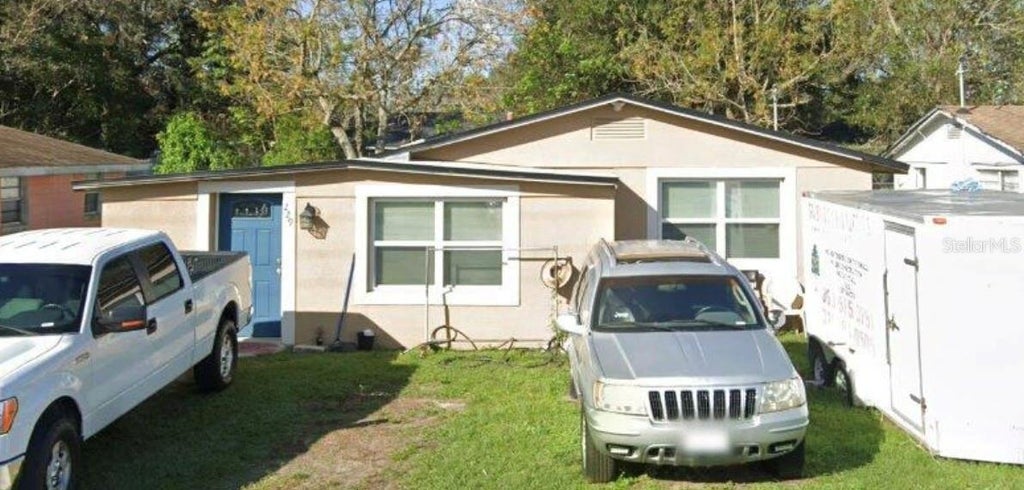 Photo of 229 Jefferson Drive, Haines City, FL 33844 (MLS # O6438099)