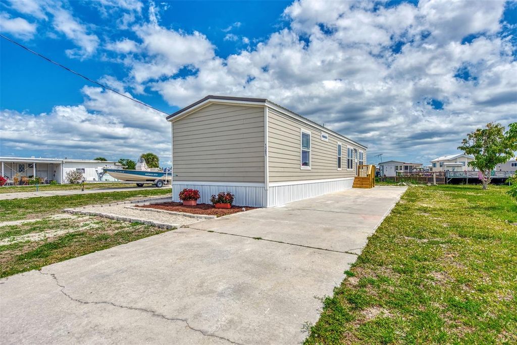 Photo of 1391 Flamingo Drive, Englewood, FL 34224 (MLS # D6143112)