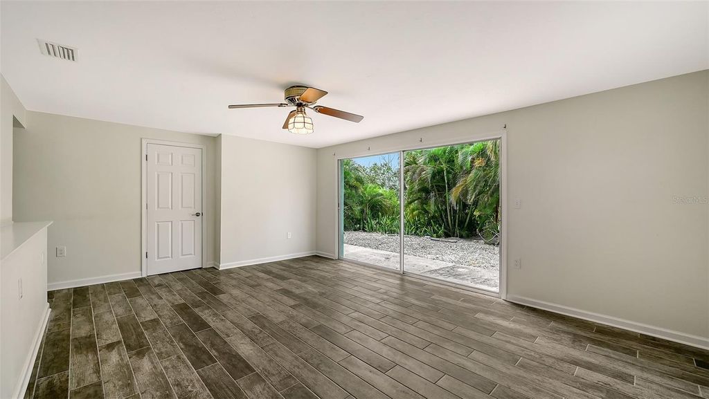 Photo of 560 Cedar Street, Longboat Key, FL 34228 (MLS # A4660709)