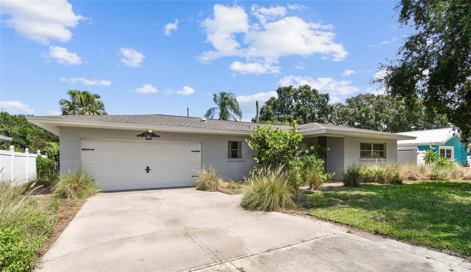 If you love the 1960s, look no further! Step back in time with this Dunedin classic, built in 1960 and brimming with original character. From pristine terrazzo floors to vintage solid wood cabinetry and chrome ceiling vents, every corner displays mid-century charm. The kitchen remains wonderfully untouched and in great condition, with a Frigidaire electric wall oven (model RBE-94) and dine-in area too, while the iconic pink-and-white tile bathroom could make even the most seasoned retro fan smile. :) Don’t forget to try the original doorbell when you tour, it’s really part of the experience.
Practical updates have already been made where it counts: new roof (2020), A/C (2023) with digital LG thermostat, water heater (2018), and a Heritage Collection steel garage door. This is a solid block construction home, 2-bedrooms and features 1.5 bathrooms, one full inside (Tub with shower) and a handy shower/toilet setup in the garage/utility area. There is also lots of space in the 2 car garage.
Set on a quiet street with a natural garden, and privacy at the rear of the property, this home offers both peace and possibility. You’re just a 5-minute drive or 8-minute bike ride to downtown Dunedin, where the Pinellas Trail, book shops, boutiques, breweries, and the waterfront marina awaits.
Yes, the home needs some electrical updates, and any aesthetic decisions you make, but that’s where the opportunity lies. Whether you’re an investor searching for an addition to your portfolio, looking for a 1031 Exchange or a buyer with a love for vintage flair, this property is a candidate for a renovation loan too. Here, character meets convenience with lots of potential. No HOA and No Flood Zone. Make an appointment today and enjoy.