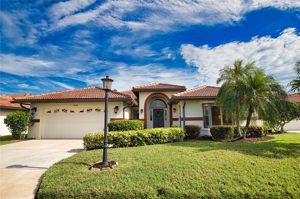 Photo of 1928 Cove Pointe Dr, Venice, FL 34293 (MLS # OM701400)