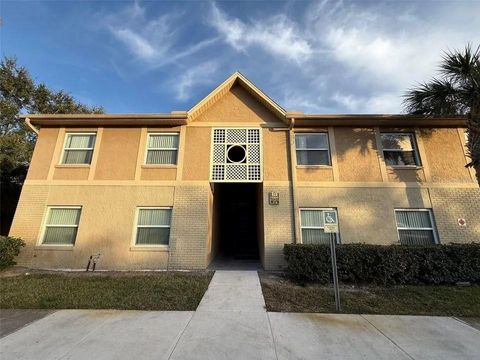 Photo of 9909 Sweepstakes Lane #4, Orlando, FL 32837 (MLS # S5147822)