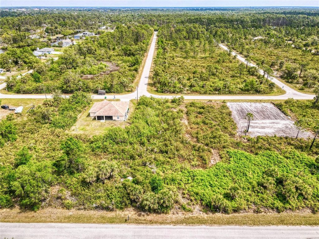 Photo of 12324 Koenig Lane, Port Charlotte, FL 33953 (MLS # O6298709)