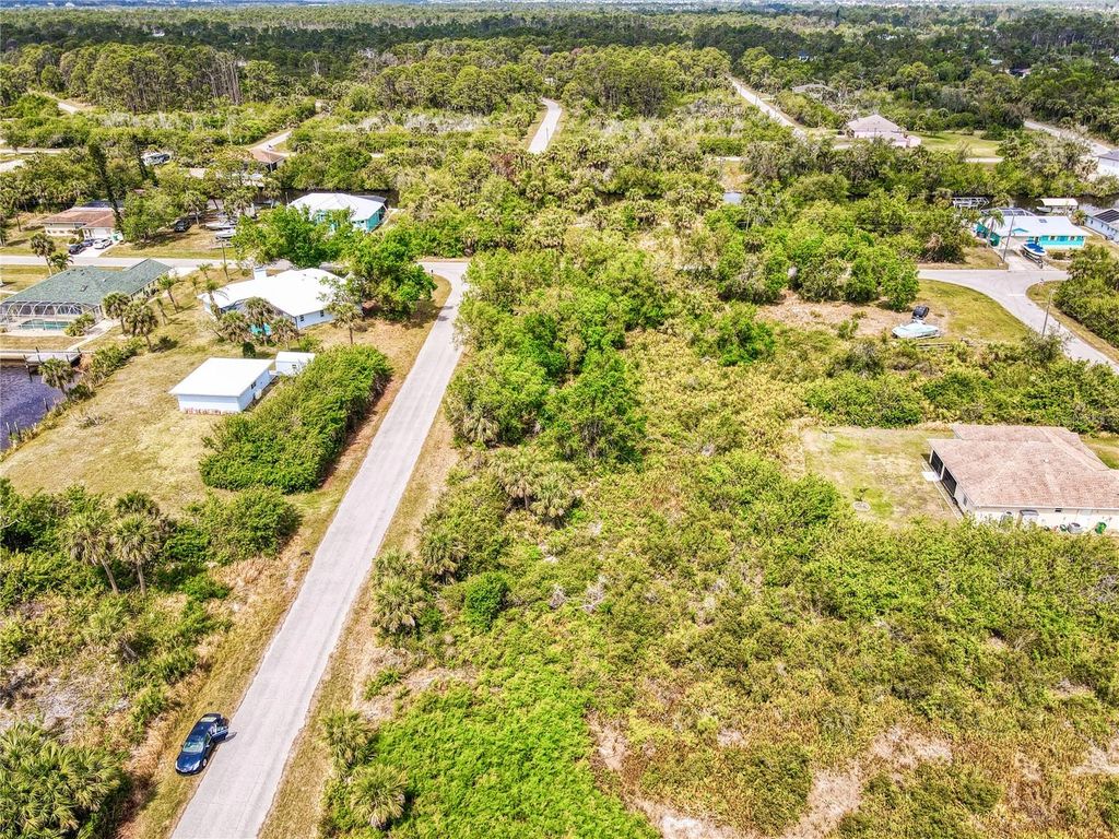 Photo of 12324 Koenig Lane, Port Charlotte, FL 33953 (MLS # O6298709)