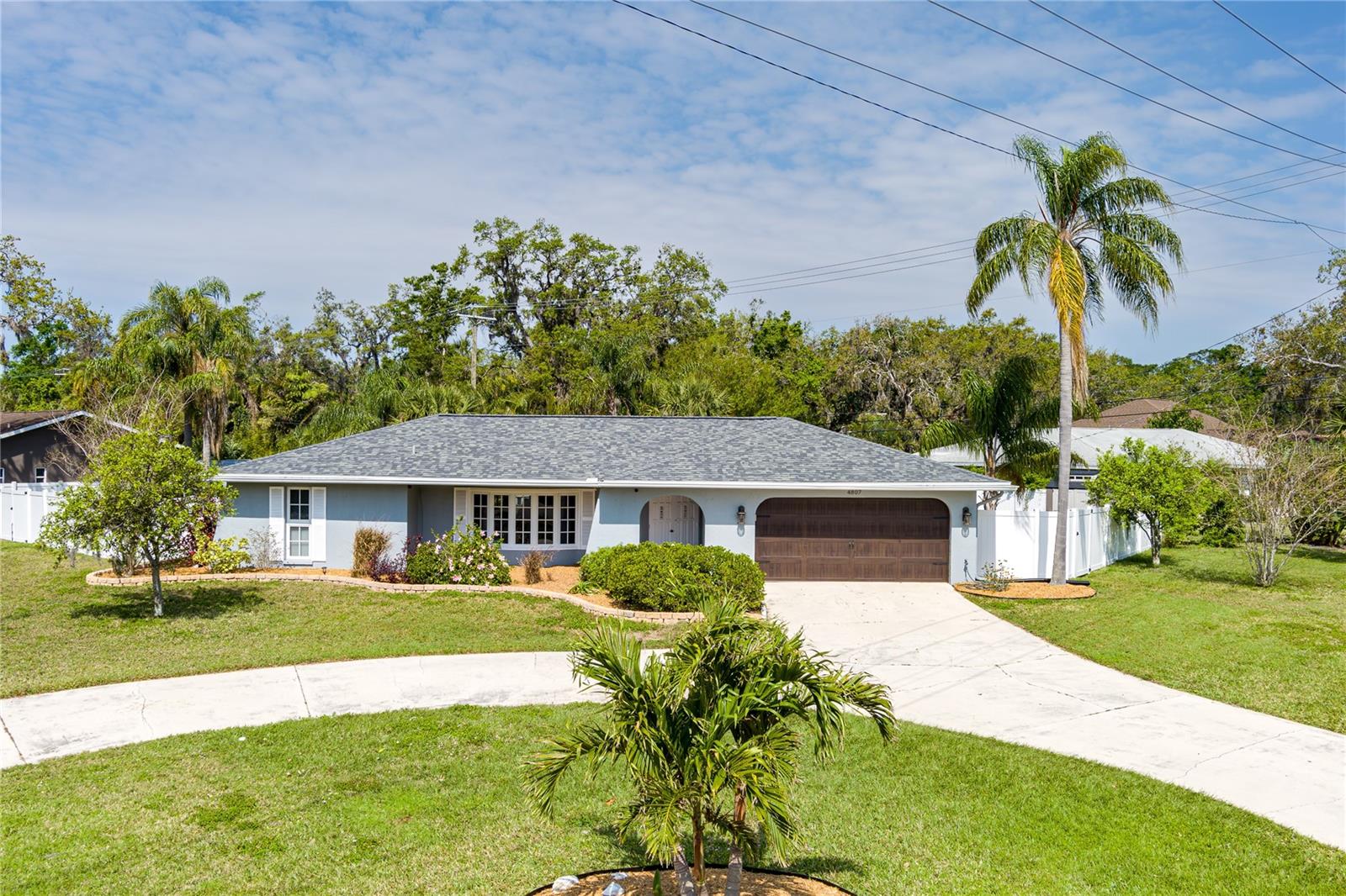 New Price! Don't miss your chance to own this incredible property! Tucked away in the desirable Desoto Lakes Country Club community, this 3-bedroom, 2-bathroom pool home sits on nearly half an acre with no HOA restrictions or fees! A quick golf cart ride to Palm Aire Country Club offers the option to enjoy golf, tennis, pickleball, a fitness center, heated pool, dining, and a lively social atmosphere. Nature lovers will appreciate being just minutes from Conservatory Park, perfect for kayaking, fishing, and outdoor adventures. Whether you're looking for a primary residence or a fantastic investment property—think Airbnb potential—this home delivers.
Step inside to discover a spacious and welcoming layout, featuring bamboo and tile flooring throughout. The beautifully updated kitchen boasts granite countertops, floor-to-ceiling soft-close cabinetry, and stainless steel appliances. The expansive primary suite includes space for a cozy sitting area, a walk-in closet, and an ensuite bath with dual sinks and a walk-in shower. On the opposite side of the home, two additional bedrooms share a full bath that conveniently doubles as a pool bath.
French doors from the Dining Room and Family Room open onto the huge screened-in lanai (32’x15’), where a resurfaced pool and spa create the perfect outdoor oasis. The paved lanai features a covered entertainment space, ideal for hosting gatherings. The fully fenced backyard backs to a wooded area, offering privacy and plenty of space to roam—great for pets or even chickens! Yes, you read that right—this property allows chickens, and the coop (plus chickens) can convey!
Recent updates include a new roof (2024), new HVAC system (2024) with cleaned ducts, newer hurricane-impact windows, a brand-new garage door with smart opener, and three sheds, one with solar power.
Centrally located, this home provides easy access to UTC, Benderson Park, SRQ Airport, and Sarasota’s world-famous beaches, shopping, dining, and cultural attractions. Don’t miss out on this exceptional home in a prime location—schedule your showing today!