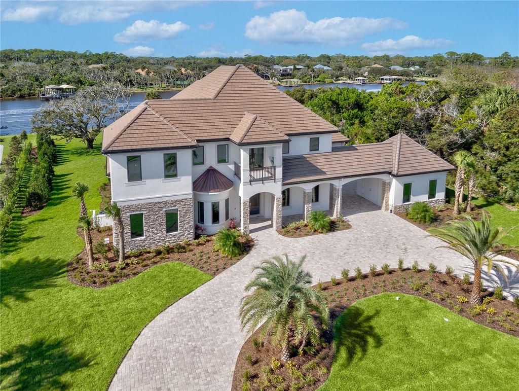 Photo of 186 Island Estates Pkwy, Palm Coast, FL 32137 (MLS # FC311016)