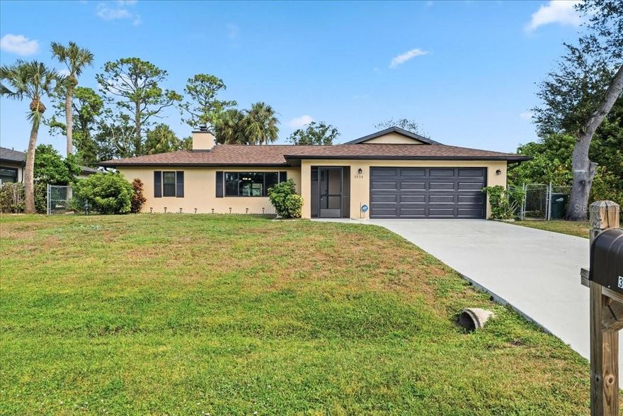 Welcome home to this well-loved and beautifully maintained **2 bedroom, 2 bathroom, 2 car garage** residence, ideally located just minutes from the Cocoplum Shoppes, dining, schools, and many other everyday conveniences in North Port.
This spacious split-floorplan home features a warm and inviting **living room with a wood-burning fireplace**, creating the perfect cozy atmosphere. The kitchen offers plenty of counter space and a comfortable breakfast nook for casual meals, while the **formal dining room overlooks the backyard**, providing a lovely setting for gatherings. The primary bathroom features an updated and tastefully tiled walk-in shower, and the guest bathroom features a tub/shower combo. 
**City water** service adds to the appeal— a highly sought-after feature in North Port. Enjoy further peace of mind with valuable upgrades including **IMPACT windows, impact doors and sliders**, and a **NEW ROOF (2023)**—excellent features that help keep insurance costs lower.
Step outside to the large covered and screened paver lanai, ideal for relaxing, entertaining, or simply enjoying the Florida breeze. The spacious backyard is fenced and perfect for a future pool!
Located in a **NO FLOOD ZONE** for added confidence and convenience.
This home has been lovingly cared for and is truly move-in ready. Schedule your showing today and experience its charm firsthand!