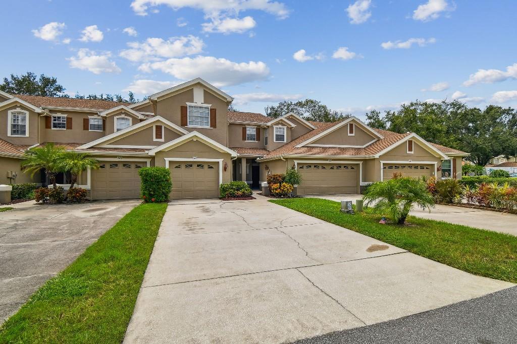 Beautifully UPDATED 3 Bedroom, 2.5 Bath, 1 Car Garage Townhome with Pond View in Gated Tarpon Springs/East Lake Area Community. A NEW HVAC system installed in 2025 along with NEW kitchen and bathroom cabinets and quartz countertops, BRAND NEW Appliances (refrigerator, stove, microwave and dishwasher), new fixtures and accessories in kitchen & baths, new luxury vinyl plank flooring in the living areas, updated light fixtures and woodworking in the living/dining area and new carpeting in the bedrooms. The community has also recently replaced the roofs! Inside the home you'll find a bright open floor plan, a generous master suite complete with walk-in closet and private en-suite bath, and spacious upstairs laundry room conveniently located near the 3 bedrooms. The townhome also offers a large screened in tiled lanai for your private peaceful pond views. In addition to the one car garage is a large outside storage closet off the screened lanai. Enjoy the Florida lifestyle in this gated community with amenities including a resort style pool and a private community dock off of Salt Lake. With direct access to the Pinellas Trail right outside the community you're just a short bike ride to the vibrant downtown Tarpon Springs, famous for its sponge docks, dining and waterfront charm. A short ride the other way will take you to some popular East Lake dining establishments and for the adventurous bikers you can travel to downtown Dunedin via the Pinellas Trail. This move in ready home combines modern updates, a prime location and a low maintenance lifestyle. Don't miss this opportunity-schedule your private tour today!