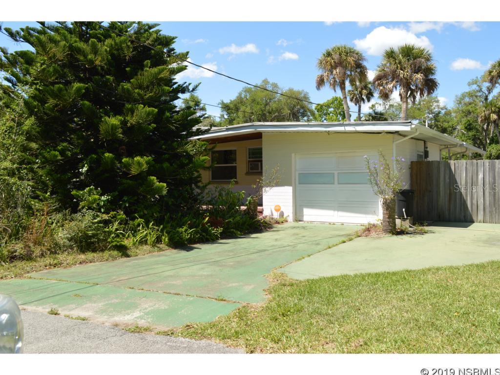 Single family home on large private lot on dead end street. Beautiful large lot goes down to small creek. Hardwood floors, retro tiled baths, block construction. Family/Florida room with nice terrazzo flooring. Tropical landscaping. Dead end street very private. Lot is almost 1/2 acre. ;Water: City