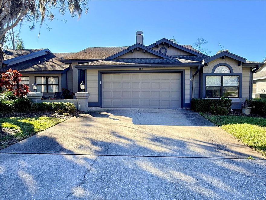 This lovely villa offers the ultimate lifestyle experience in one of the most loved sections of the East Lake Woodlands golf course community. Tucked away off of the main road you have the luxury of enjoying a morning walk or starting your day with a cup of coffee on your screened lanai that has a peaceful water view and wildlife for your viewing pleasure. Add to that the opportunity to join The Ardea Country Club(which is optional)  which boasts of two championship golf courses plus several dining experiences. If golfing is not your thing there is always tennis, pickle ball and your own community pool. This home is ready for the new owner and is beautifully appointed with upgrades. 
The open floor plan of the home currently is designed with an office and 2 bedrooms but could easily be transitioned to a third bedroom. When the weather turns chilly there is a cozy fireplace and a wet bar in the spacious great room. A large covered screened lanai is a perfect place for gathering with friends and family. Not only does the neighborhood have many recreational and dining experiences within but also many choices close by. New A/C, freshly painted interior, park like landscaping and many benefits covered by your HOA fees.