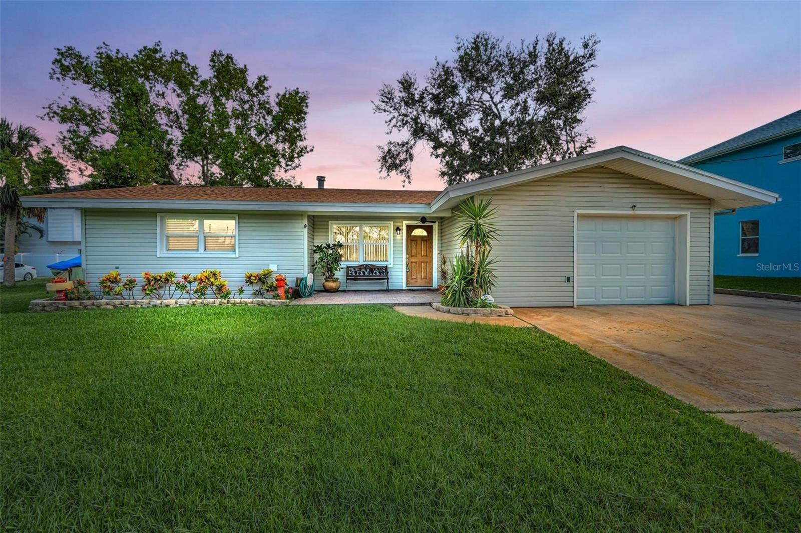 Welcome to your completely renovated waterfront retreat with 89 feet of prime frontage on a deep-water canal leading directly to the bayous, Anclote River, and the Gulf of Mexico. Perfect for boating enthusiasts, this property features a private dock with a 12,000 lb boat lift, a well-constructed seawall with no damage, and ownership that extends into the water. Three is a wall of sliding glass doors that spans the back of the home, flooding the living spaces with natural light and offering breathtaking water views. This light and bright 2-bedroom, 2-bath home also includes a spacious 2-car garage and wide driveway with plenty of room for your RV, boat, cars, or trucks. One full bath is conveniently located in the garage, ideal after a day on the water. Recent updates include a new roof, new HVAC (2024), new water heater, hurricane impact windows with shutters, fresh interior paint, a new garage floor coating, and added insulation—everything has been thoughtfully upgraded for comfort and efficiency. The open layout is anchored by a cozy wood-burning fireplace in the family room, complemented by stylish finishes and designer lighting. Outdoors, enjoy a pavered front porch, a covered back porch with ceiling fans, a large shed, rain barrel, outdoor shower, and a fenced backyard with room for a pool. With no HOA and no deed restrictions, you’ll enjoy the freedom to truly make this property your own. Minutes To Fred Howard Park And Beach, Sunset Beach, Craig Park, Shopping, The World-Famous Historic Sponge Docks, Fine Waterfront Dining, Downtown Tarpon Springs with Antique Shops, Quaint Shops, Florida Hospital, The Pinellas Trail, Golfing, Great Schools, 30-45 Minutes To Tampa International Airport, Busch Gardens. In Tarpon Springs You Have All Of The Conveniences Of A Big City In A Community That Has Maintained Its Old World Charm. Whether you’re relaxing indoors with panoramic water views, entertaining on the porch, or heading out for a sunset cruise, this home delivers the ultimate Florida lifestyle.