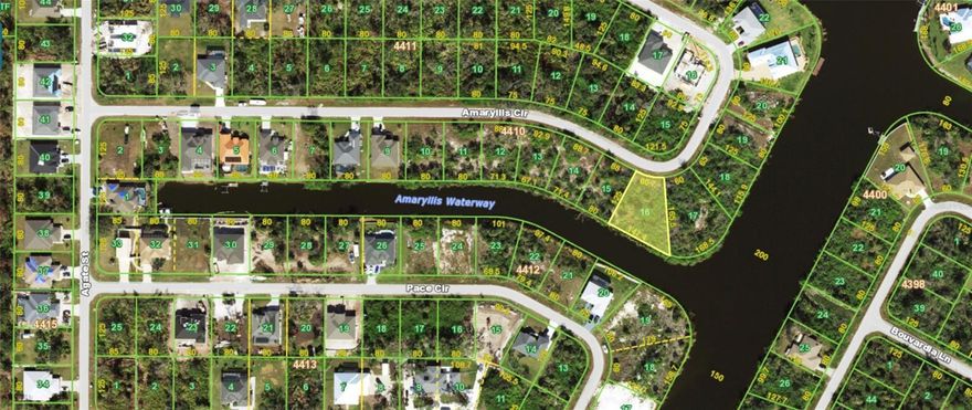 Welcome to your slice of paradise in the heart of South Gulf Cove—one of Southwest Florida’s most sought-after waterfront communities. This oversized vacant parcel is nestled along the picturesque Amaryllis Waterway, offering the perfect canvas to build your custom dream home with direct access to the Gulf of Mexico via a system of scenic canals. Whether you're ready to build now or hold as an investment, this property offers exceptional value in a growing waterfront neighborhood.