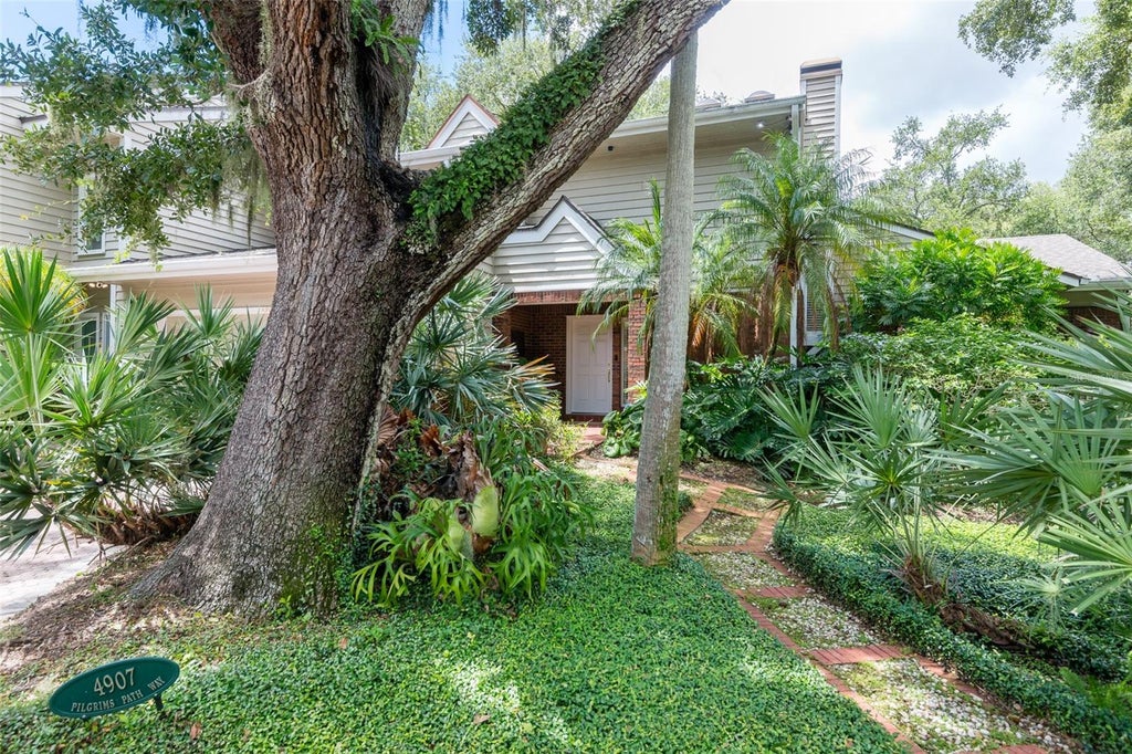 Photo of 4907 Pilgrims Path Way, Tampa, FL 33611 (MLS # TB8546270)