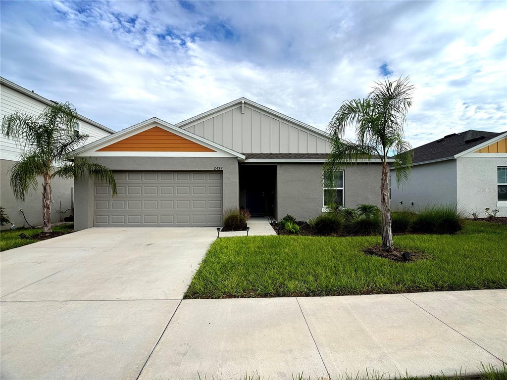 Photo of 2437 Oakwood Lane, Davenport, FL 33837 (MLS # O6448057)
