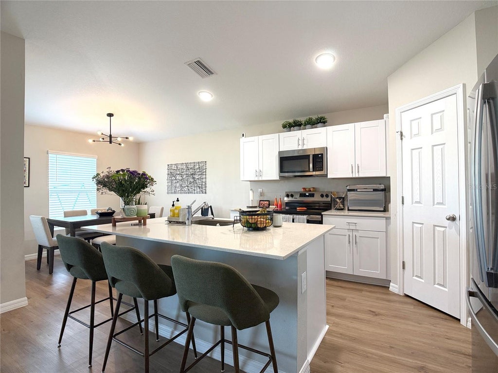 Photo of 2437 Oakwood Lane, Davenport, FL 33837 (MLS # O6448057)