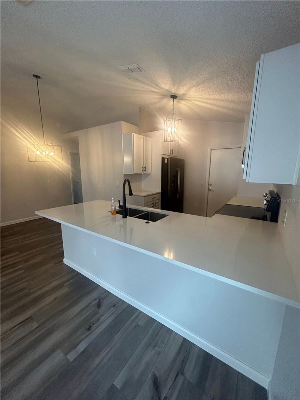 Photo of 5224 Florida Holly Drive, Orlando, FL 32811 (MLS # O6405369)