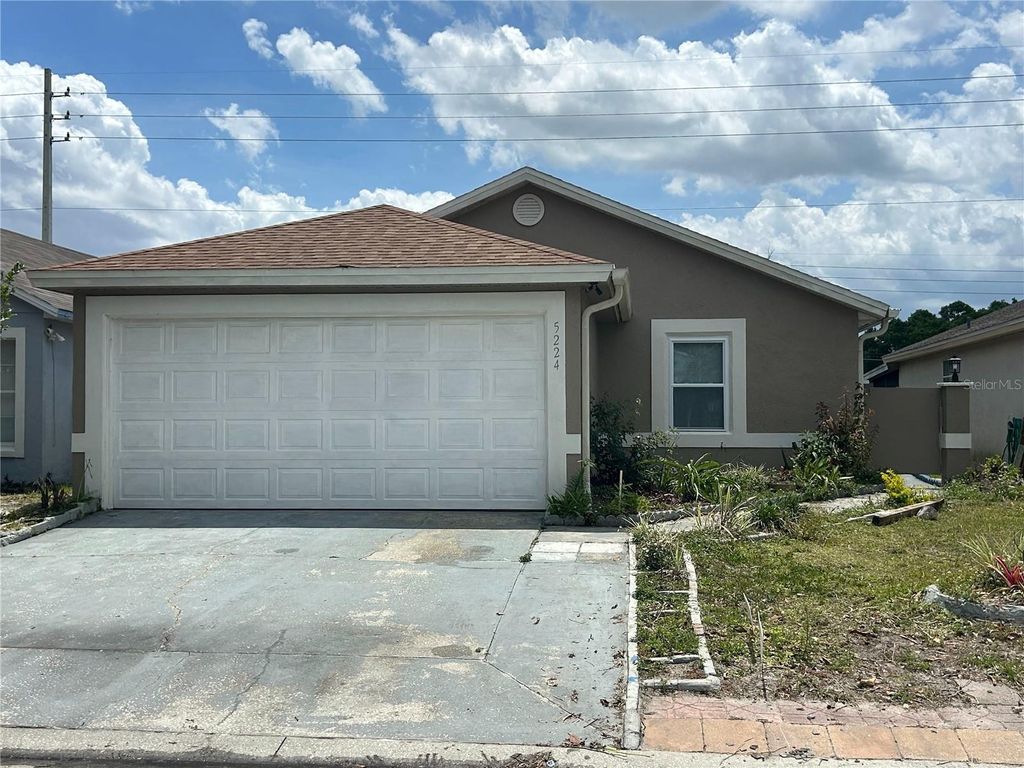Photo of 5224 Florida Holly Drive, Orlando, FL 32811 (MLS # O6405369)