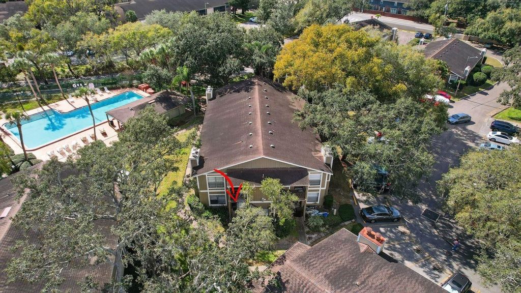 Photo of 14319 Hanging Moss Circle #102, Tampa, FL 33613 (MLS # TB8467578)