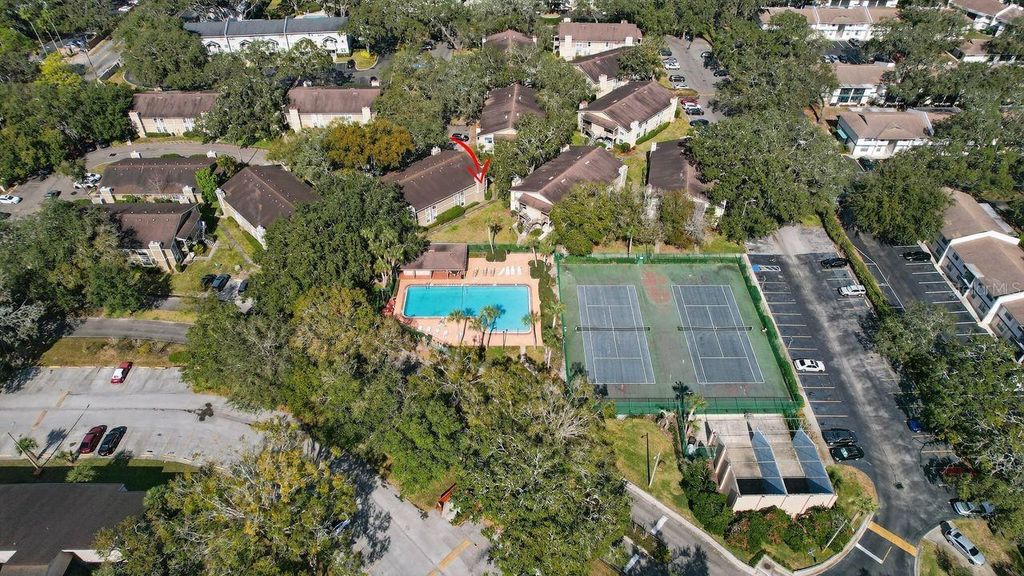 Photo of 14319 Hanging Moss Circle #102, Tampa, FL 33613 (MLS # TB8467578)