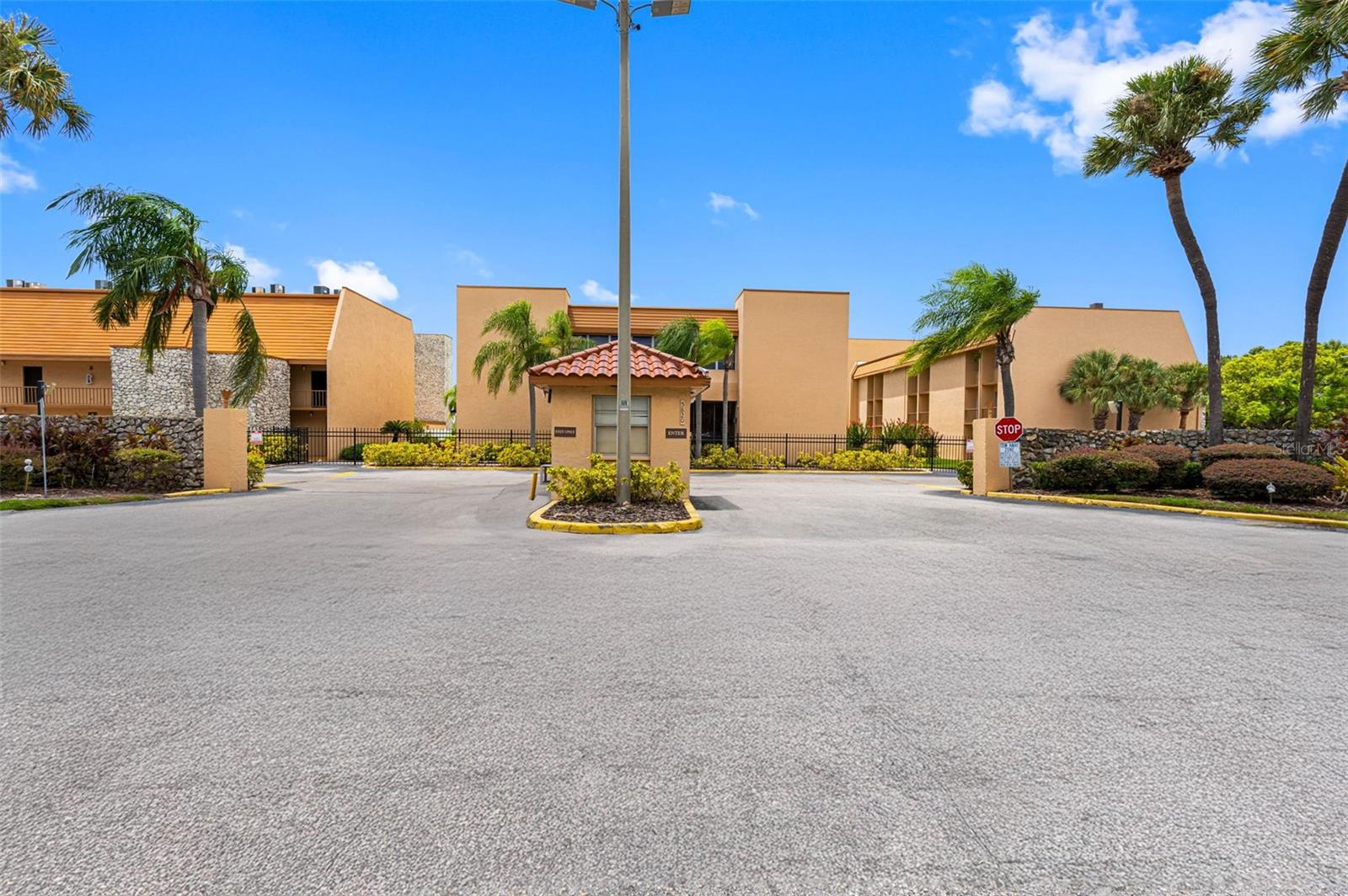 ***LOCATION, LOCATION, LOCATION*** - Discover this beautifully maintained 2-bedroom, 2-bath condo located in the highly desirable Tampa Racquet Club, a gated community known for its resort-style amenities and unbeatable location just off Dale Mabry Highway. This spacious third-floor unit offers nearly 1,100 square feet, making it the largest 2-bedroom floor plan in the community. Conveniently located near the elevator, the interior features stylish wood laminate and tile flooring throughout - completely carpet-free for easy maintenance. The bright, functional kitchen is equipped with maple cabinets and faux granite countertops and opens seamlessly into a generous living area. Sliding glass doors lead to a private balcony with serene views of the courtyard, pool, and tennis courts - an ideal spot for morning coffee or relaxing after a long day. The split floor plan provides privacy with two roomy bedrooms and two full bathrooms, making it perfect for roommates, guests, or a home office setup. The condo also includes all major appliances, including a washer and dryer, so it's move-in ready. Residents of Tampa Racquet Club enjoy access to a wide range of amenities, including an Olympic-size swimming pool, a clubhouse with pool tables, and courts for tennis, racquetball, basketball, and pickleball. The well-maintained grounds and secure gated entry enhance the community's appeal. Located just minutes from major highways, shopping, dining, and entertainment, this condo offers the perfect balance of comfort, convenience, and lifestyle in the heart of Tampa. DON'T MISS THIS AMAZING FIND!